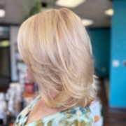 A woman who just received a grey coverage touch up in Walnut Creek