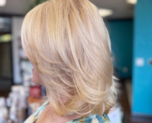 A woman who just received a grey coverage touch up in Walnut Creek