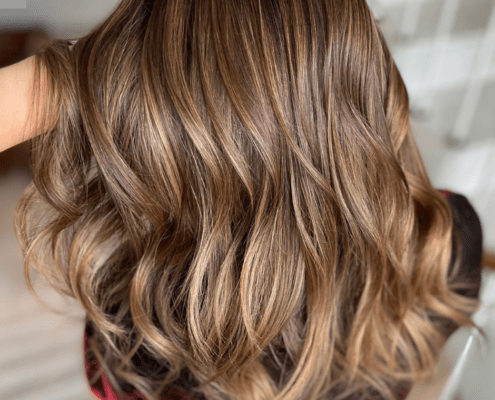 A walnut creek salon helping a woman keep her brunette highlights from turning brassy
