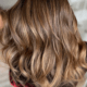 A walnut creek salon helping a woman keep her brunette highlights from turning brassy